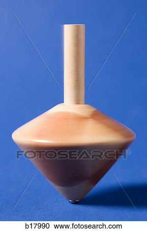 Stock Image - Wooden top.. Fotosearch