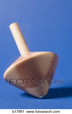 Stock Image - Wooden top.. Fotosearch