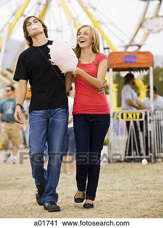 young couple at an amusement park View Large Photo Image Stock Image - young couple at an amusement park. Fotosearch