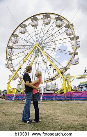 young couple at an amusement park View Large Photo Image Stock Image - young couple at an amusement park. Fotosearch
