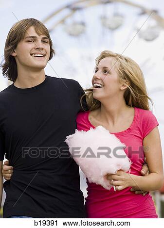 young couple at an amusement park View Large Photo Image Stock Image - young couple at an amusement park. Fotosearch