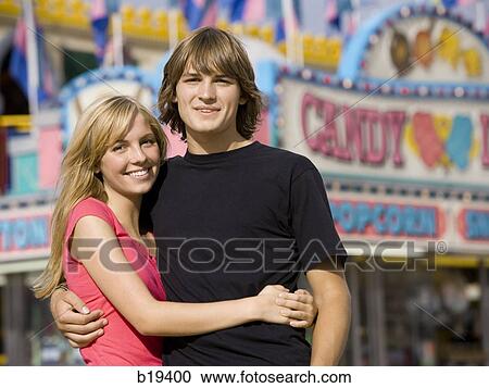 young couple at an amusement park View Large Photo Image Stock Image - young couple at an amusement park. Fotosearch