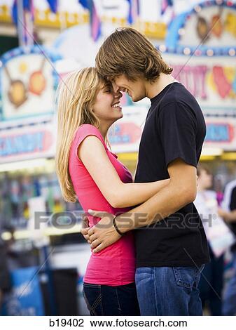 young couple at an amusement park View Large Photo Image Stock Image - young couple at an amusement park. Fotosearch