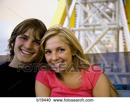 young couple at an amusement park View Large Photo Image Stock Image - young couple at an amusement park. Fotosearch