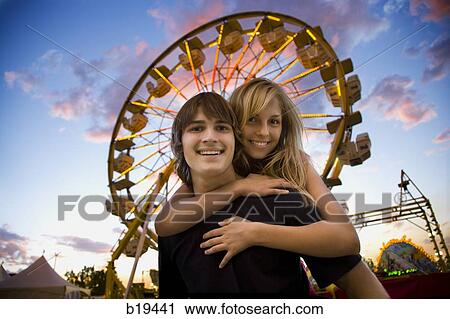 young couple at an amusement park View Large Photo Image Stock Image - young couple at an amusement park. Fotosearch