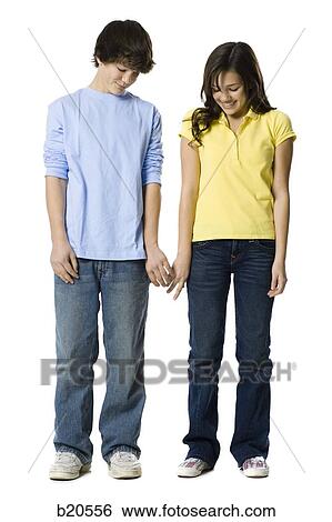 young couple holding hands View Large Photo Image Stock Photograph - young couple holding hands. Fotosearch