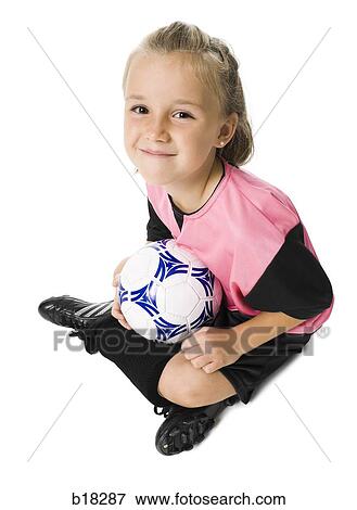 Young girl in a soccer uniform with ball. View Large Photo Image Stock Photo - Young girl in a soccer uniform with ball.. Fotosearch