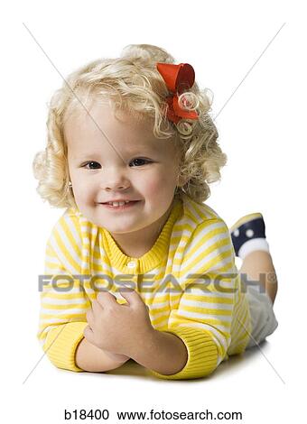 Young girl in a yellow sweater. View Large Photo Image Stock Image - Young girl in a yellow sweater.. Fotosearch