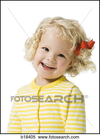 Young girl in a yellow sweater. View Large Photo Image Stock Photography - Young girl in a yellow sweater.. Fotosearch