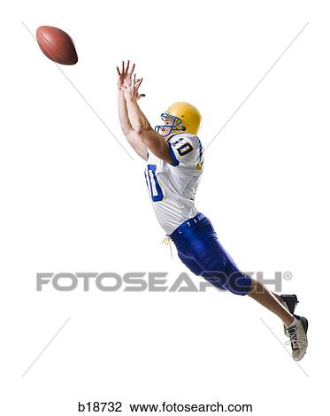 Young male American football player. View Large Photo Image Stock Image - Young male American football player.. Fotosearch