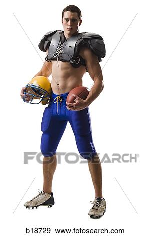 Young male American football player. View Large Photo Image Stock Photo - Young male American football player.. Fotosearch