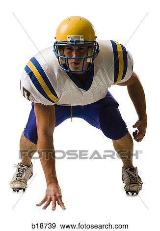 Young male American football player. View Large Photo Image Stock Photo - Young male American football player.. Fotosearch