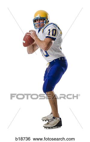 Young male American football player. View Large Photo Image Stock Photograph - Young male American football player.. Fotosearch