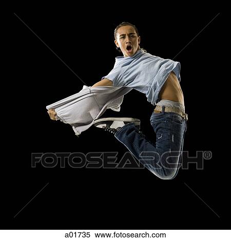 Stock Photography - young man dancing. Fotosearch