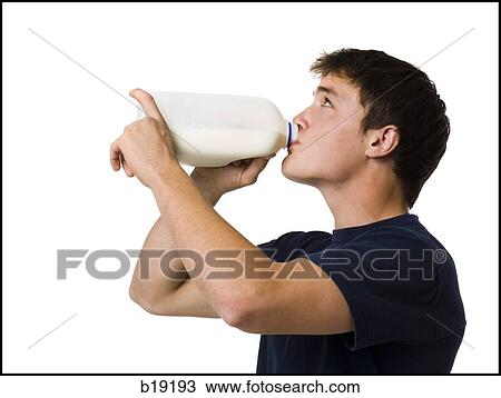 young man drinking milk. View Large Photo Image Stock Image - young man drinking milk.. Fotosearch