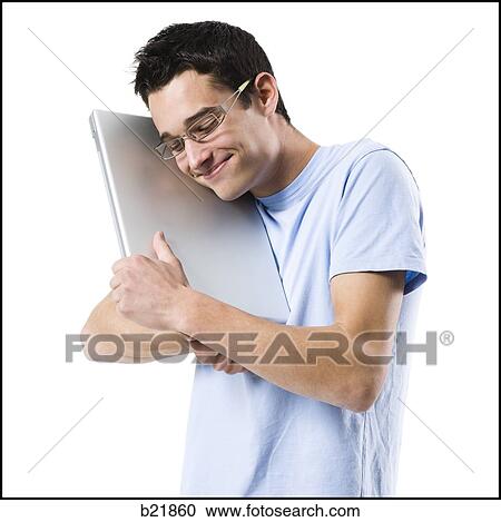 young man in a blue shirt View Large Photo Image Stock Image - young man in a blue shirt. Fotosearch