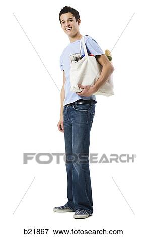 Stock Photo - young man in a blue shirt. Fotosearch