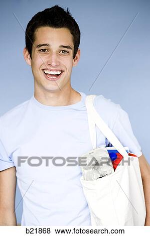 young man in a blue shirt View Large Photo Image Stock Photo - young man in a blue shirt. Fotosearch
