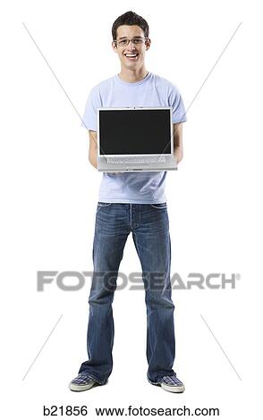 Stock Photograph - young man in a blue shirt. Fotosearch