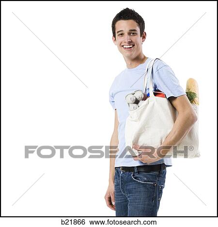 young man in a blue shirt View Large Photo Image Stock Photograph - young man in a blue shirt. Fotosearch