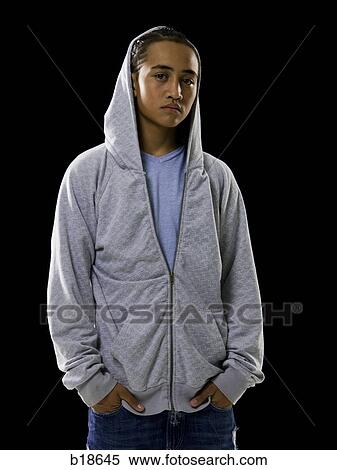 Young man in a hoodie. View Large Photo Image Stock Photography - Young man in a hoodie.. Fotosearch