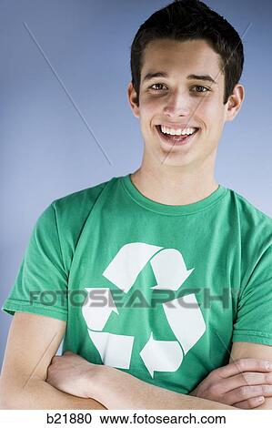 Stock Image - young man in a recycling t-shirt. Fotosearch