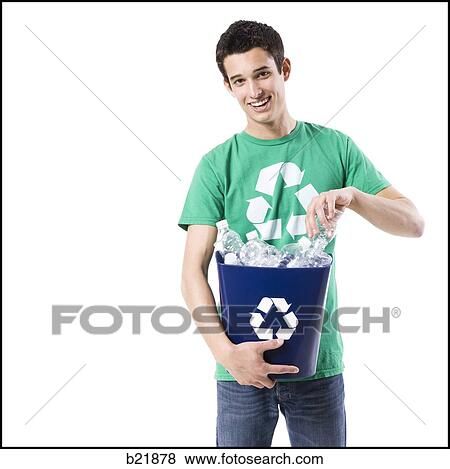 young man in a recycling t-shirt View Large Photo Image Stock Photo - young man in a recycling t-shirt. Fotosearch