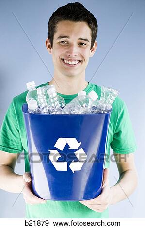 young man in a recycling t-shirt View Large Photo Image Stock Photo - young man in a recycling t-shirt. Fotosearch