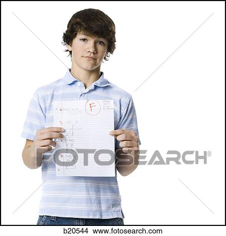 young man showing the grade he received View Large Photo Image Picture - young man showing the grade he received. Fotosearch