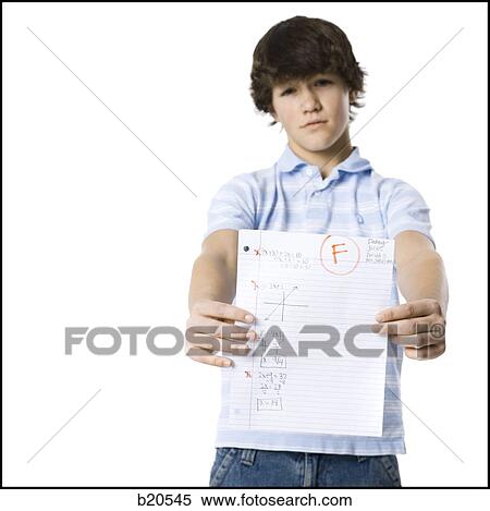 young man showing the grade he received View Large Photo Image Stock Photography - young man showing the grade he received. Fotosearch