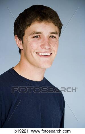 young man smiling. View Large Photo Image Stock Image - young man smiling.. Fotosearch