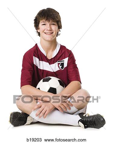 young man with a soccer ball. View Large Photo Image Stock Image - young man with a soccer ball.. Fotosearch