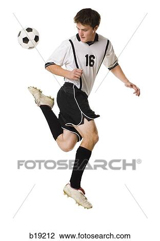 young man with a soccer ball. View Large Photo Image Stock Image - young man with a soccer ball.. Fotosearch
