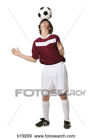 young man with a soccer ball. View Large Photo Image Stock Photo - young man with a soccer ball.. Fotosearch