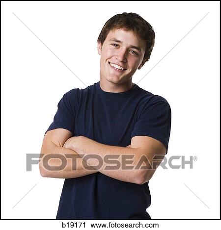 young man with arms folded. View Large Photo Image Stock Image - young man with arms folded.. Fotosearch