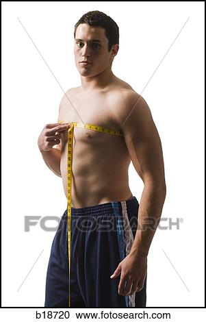 Young man working out. View Large Photo Image Stock Image - Young man working out.. Fotosearch