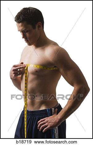 Young man working out. View Large Photo Image Stock Photo - Young man working out.. Fotosearch