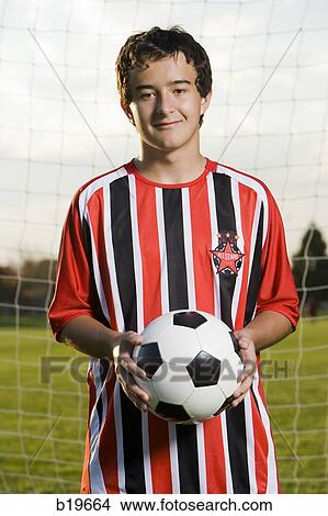 Picture - young soccer player. Fotosearch