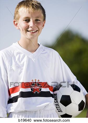 Stock Image - young soccer player. Fotosearch