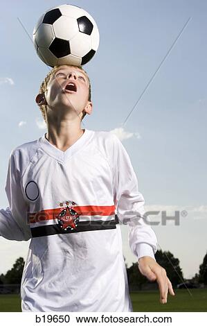 Stock Image - young soccer player. Fotosearch