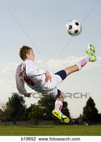 Stock Image - young soccer player. Fotosearch