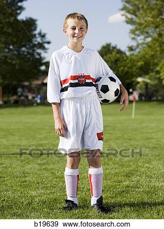 Stock Photo - young soccer player. Fotosearch