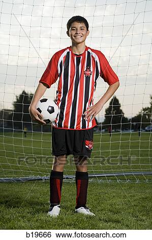 Stock Photograph - young soccer player. Fotosearch