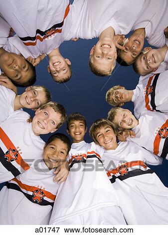young soccer players in a circle View Large Photo Image Stock Photo - young soccer players in a circle. Fotosearch