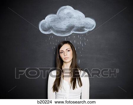 young woman against a chalkboard View Large Photo Image Picture - young woman against a chalkboard. Fotosearch