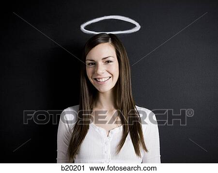 young woman against a chalkboard View Large Photo Image Stock Image - young woman against a chalkboard. Fotosearch
