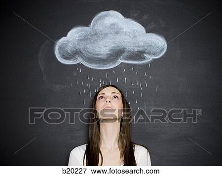 young woman against a chalkboard View Large Photo Image Stock Photo - young woman against a chalkboard. Fotosearch