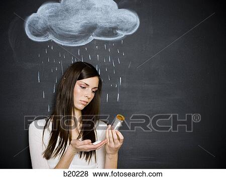young woman against a chalkboard View Large Photo Image Stock Photo - young woman against a chalkboard. Fotosearch