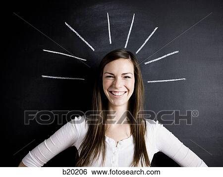 young woman against a chalkboard View Large Photo Image Stock Photograph - young woman against a chalkboard. Fotosearch