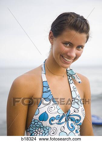 Young woman at the beach. View Large Photo Image Picture - Young woman at the beach.. Fotosearch